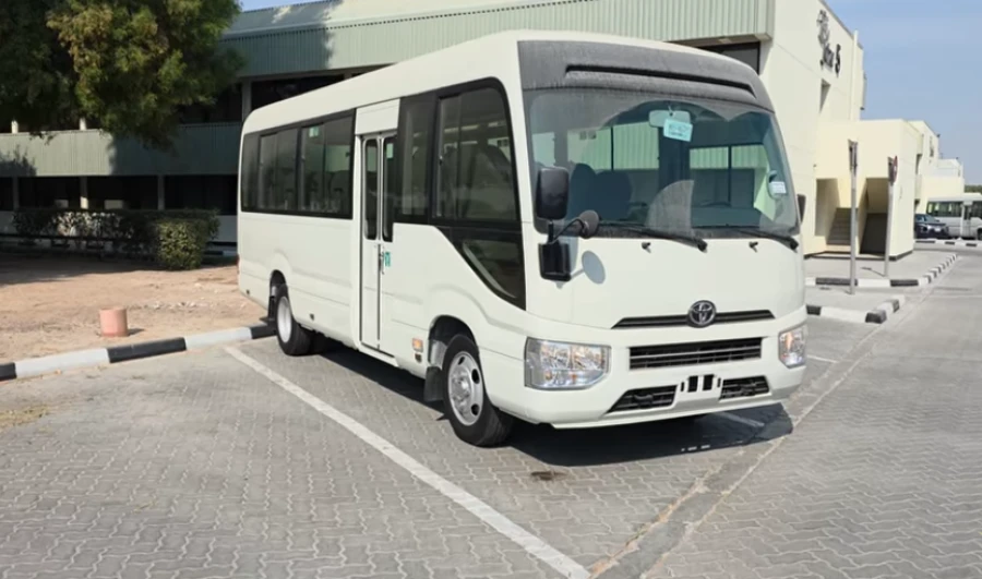 Toyota Coaster bus taxi for large Umrah groups, private licensed driver, Saudi Arabia